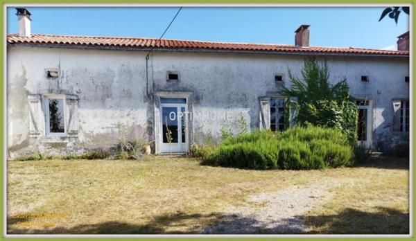 ensemble de 2 maisons en pierre + grange + grand terrain