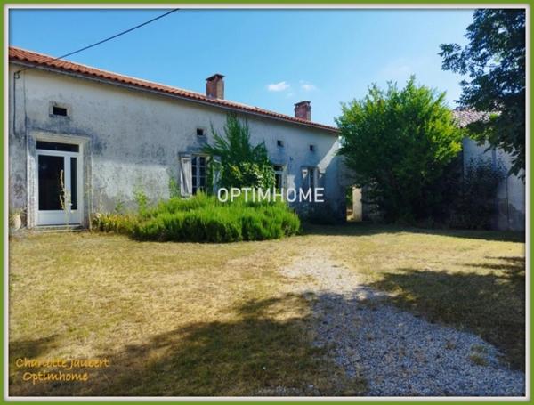 ensemble de 2 maisons en pierre + grange + grand terrain