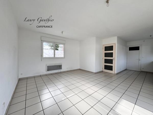 Maison semi-individuelle 66 m² – 2 chambres – Garage – Jardin – Calme – Centre de Comines