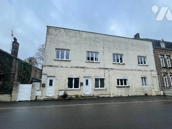 ENSEMBLE IMMOBILIER MITOYEN D'UN COTE