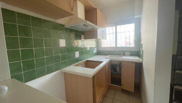 Maison de ville avec garage et jardin