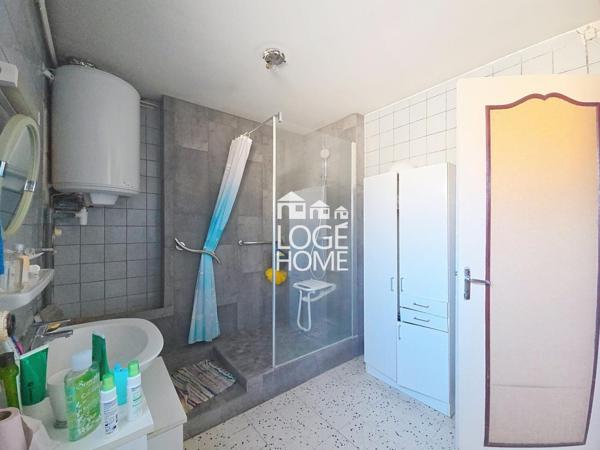 Maison semi individuelle - chambres - garage - cour
