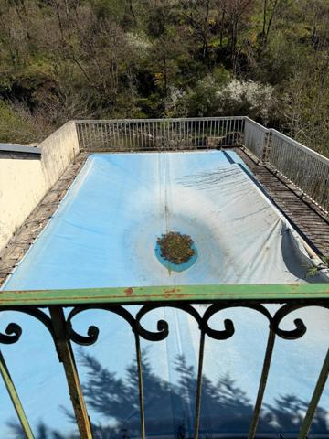 Laissez-vous séduire par le charme authentique de ce moulin à rénover niché au cœur de l’Aveyron