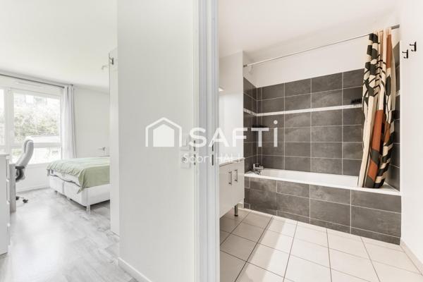 Appartement 3 pièces de 64m², immeuble récent de standing avec jardin et terrasse de 52m², exposé Sud-Ouest