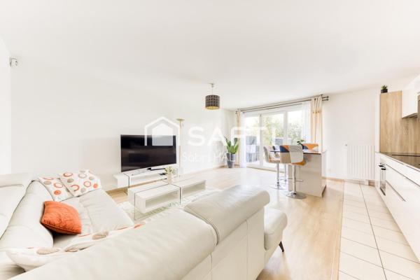 Appartement 3 pièces de 64m², immeuble récent de standing avec jardin et terrasse de 52m², exposé Sud-Ouest