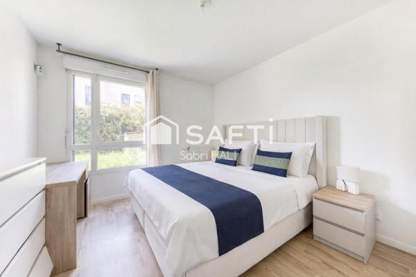 Appartement 3 pièces de 64m², immeuble récent de standing avec jardin et terrasse de 52m², exposé Sud-Ouest
