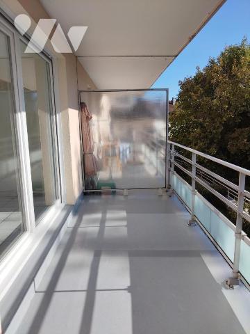 Appartement en parfait état 2ch avec balcon, garage et vue dégagée