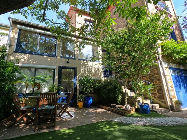 Belle meulière au cachet intemporel