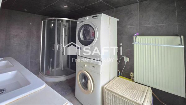 Maison sur trois niveaux dans une ruelle calme