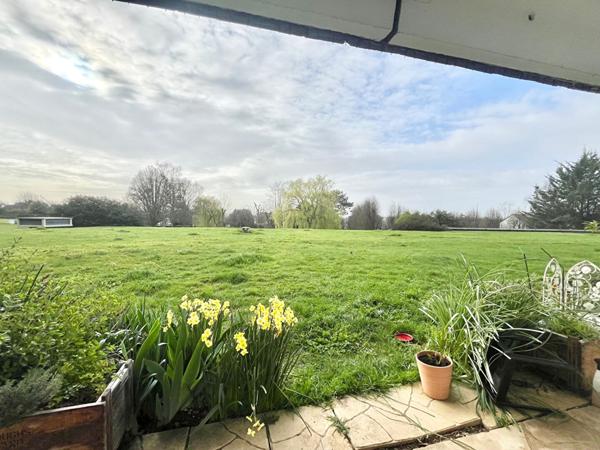 Appartement Caen 4 pièce(s) 90 m2 - rez de jardin - terrasse sud - cave - garage fermé