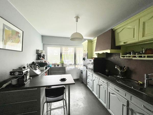 Appartement Caen 4 pièce(s) 90 m2 - rez de jardin - terrasse sud - cave - garage fermé