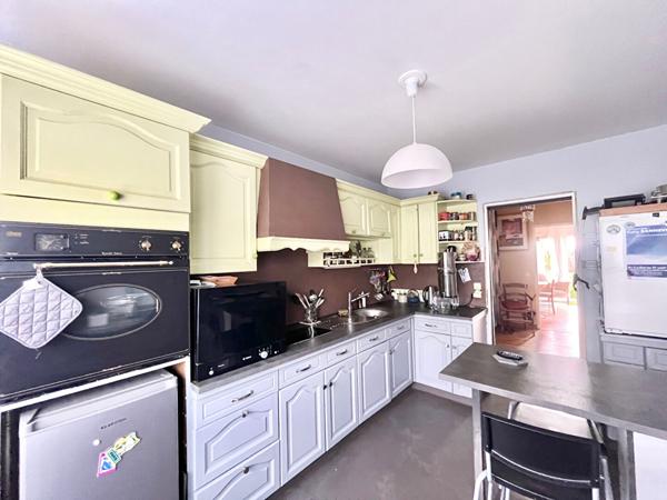 Appartement Caen 4 pièce(s) 90 m2 - rez de jardin - terrasse sud - cave - garage fermé