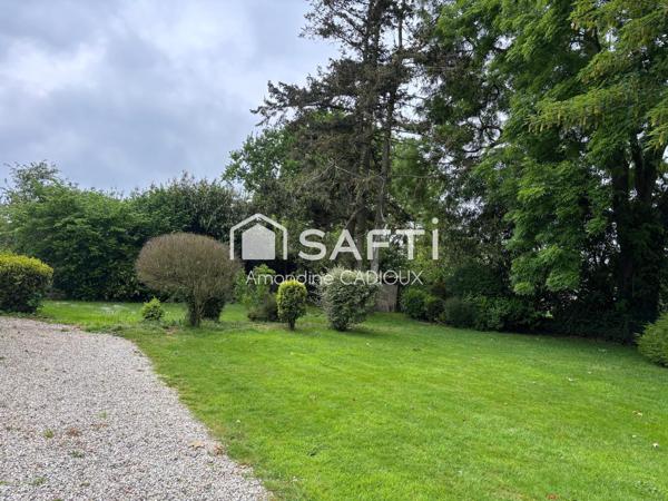 belle maison avec jardin arborer