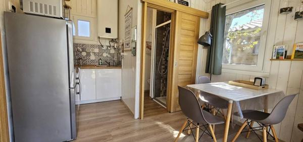 Terrain constructible 1 200m2 avec 2 gîtes