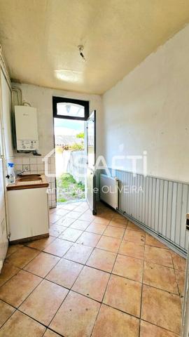 Idéal 1er achat ou investissement locatif : Maison de ville de 4 pièces avec cour, jardinet avec batiment proche hyper centre