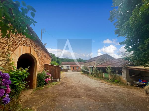 A vendre charmant corps de ferme avec une tranquillité totale