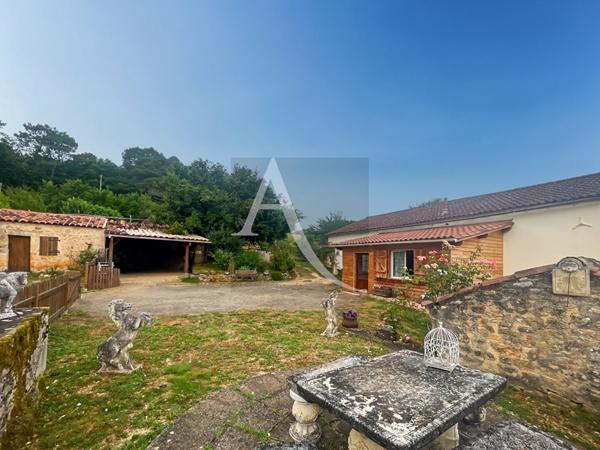 A vendre charmant corps de ferme avec une tranquillité totale