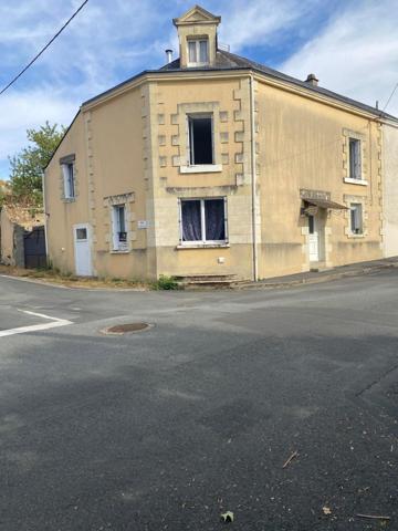 Maison de ville offrant de beaux potentiels