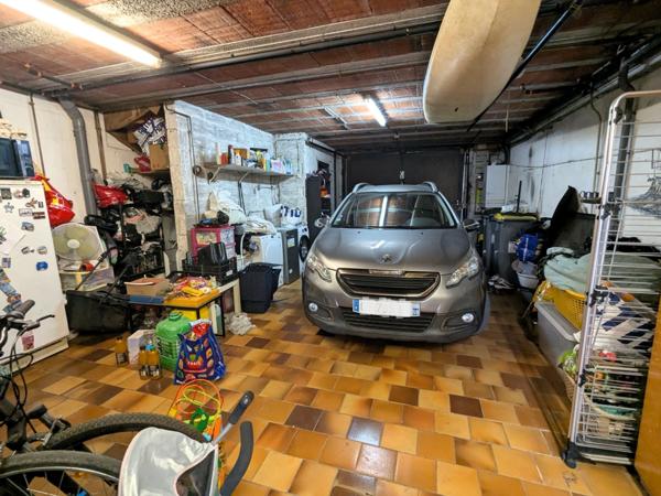 Maison bel étage avec jardin et grand garage