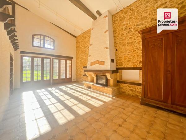 Bâtisse de caractère avec terrain constructible