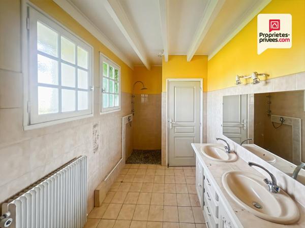 Bâtisse de caractère avec terrain constructible