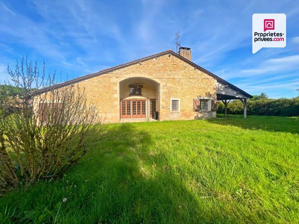 Bâtisse de caractère avec terrain constructible