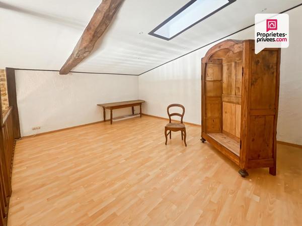 Bâtisse de caractère avec terrain constructible