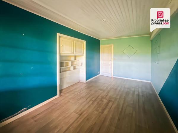 Bâtisse de caractère avec terrain constructible