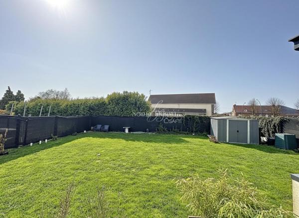 MAISON SEMI MITOYENNE EN SEMI PLAIN PIED 3 CHAMBRES VERANDA JARDIN GARAGE