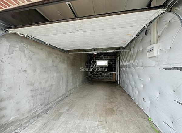 MAISON SEMI MITOYENNE EN SEMI PLAIN PIED 3 CHAMBRES VERANDA JARDIN GARAGE