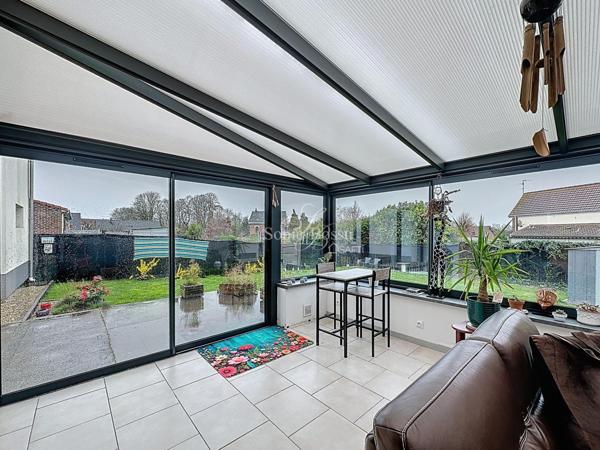 MAISON SEMI MITOYENNE EN SEMI PLAIN PIED 3 CHAMBRES VERANDA JARDIN GARAGE