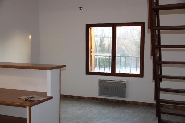 APPARTEMENT SUR 2 NIVEAUX AVEC EMPLACEMENT PARKING ET CAVE