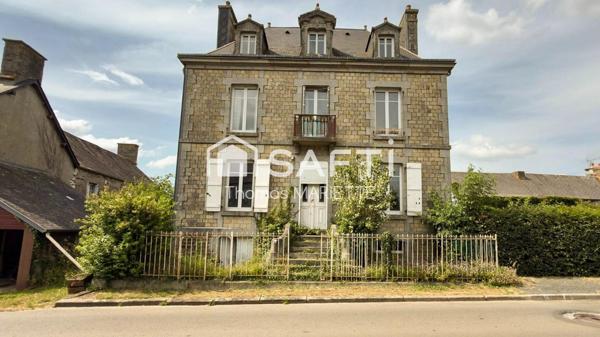Maison en pierre de caractère à restaurer de 130 m² avec 4 chambres, toiture récente, double vitrage, combles aménageables et jardin. Secteur calme à Larchamp, à 50 min de la mer. Fort potentiel !