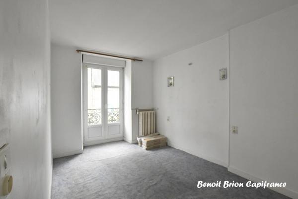 Maison de ville 148 m² – Centre d’Antrain – 4 chambres – Grande cave