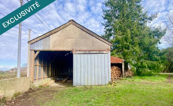 Bâtisse en pierre à rénover avec hangar sur terrain de 2 210 m².