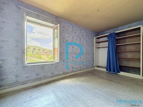 APPARTEMENT/PLATEAU A RENOVER AVEC CAVE ET GARAGE