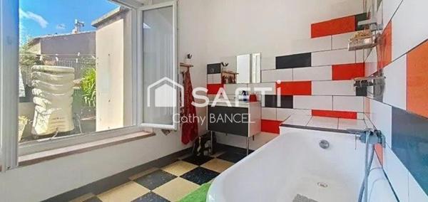 Appartement atypique avec grande terrasse de 80 m²