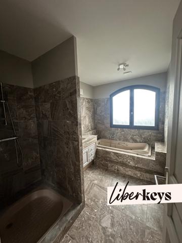 Maison familiale 7 pièces de 209m² et 1250m² de terrain - Millery