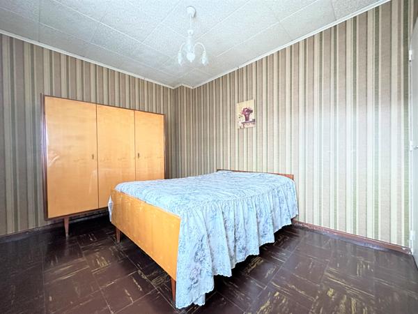 Maison mitoyenne, 4 chambres, garage, véranda, jardin