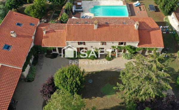 Bien de prestige en centre bourg.