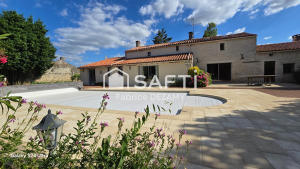 Bien de prestige en centre bourg.