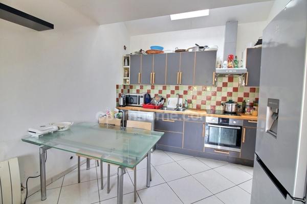 Appartement 3 pièces de 65 m2 en duplex + studio de 20 m2 avec parkings à vendre à CARRIERES SOUS POISSY (78)