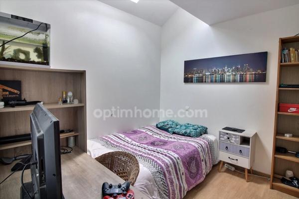 Appartement 3 pièces de 65 m2 en duplex + studio de 20 m2 avec parkings à vendre à CARRIERES SOUS POISSY (78)
