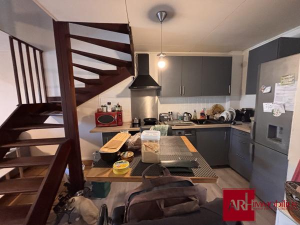 Maison mitoyenne F3/4 Jardinet