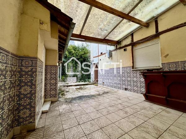 Maison avec 2 logements, cour et terrasse