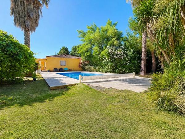Maison de plain-pied 155 m² avec garage de 92m2, piscine et terrain arboré à MONTAGNAC (34)