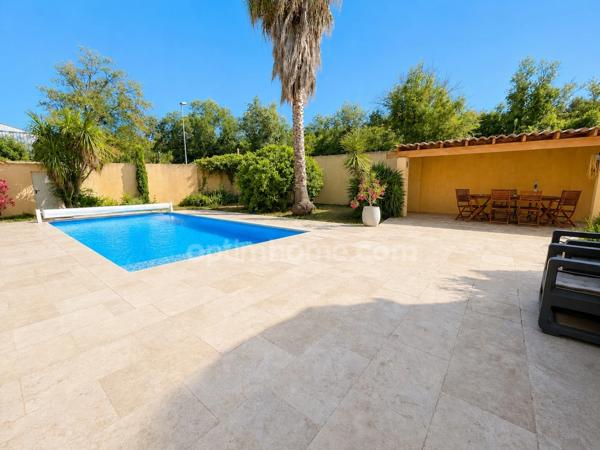 Maison de plain-pied 155 m² avec garage de 92m2, piscine et terrain arboré à MONTAGNAC (34)
