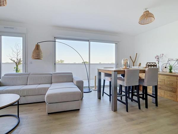 APPARTEMENT AVEC TERRASSE DANS RÉSIDENCE DE STANDING AU COEUR DE PAREMPUYRE.