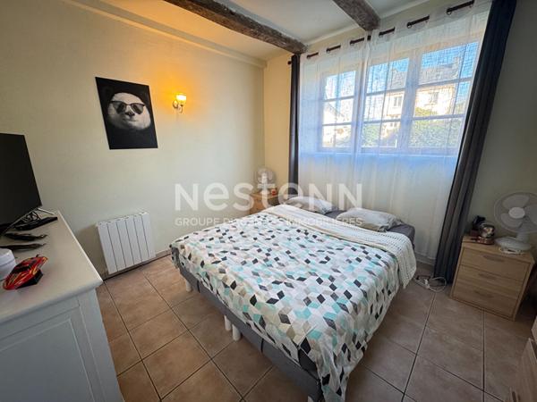 Ensemble immobilier avec une maison principale et un logement locatif à vendre à Moustoir-Remungol