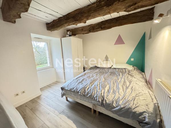 Ensemble immobilier avec une maison principale et un logement locatif à vendre à Moustoir-Remungol